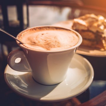 mounted coffee makers benefits best models brands cup of coffee with tsp in it cake on a plate in the background